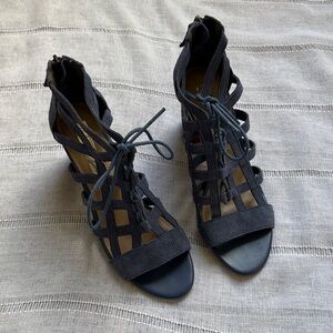 Aubrey Lynn blue suede gladiator-style heels with a tie and zip closure